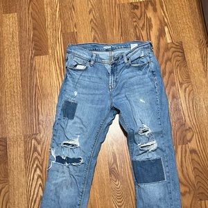Jeans with custom rips and patches